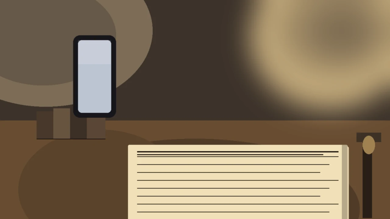 Medium view of a small desk at night with an open paper notebook showing a one-day ledger grid and a phone propped against a stack of paperbacks under a warm desk lamp